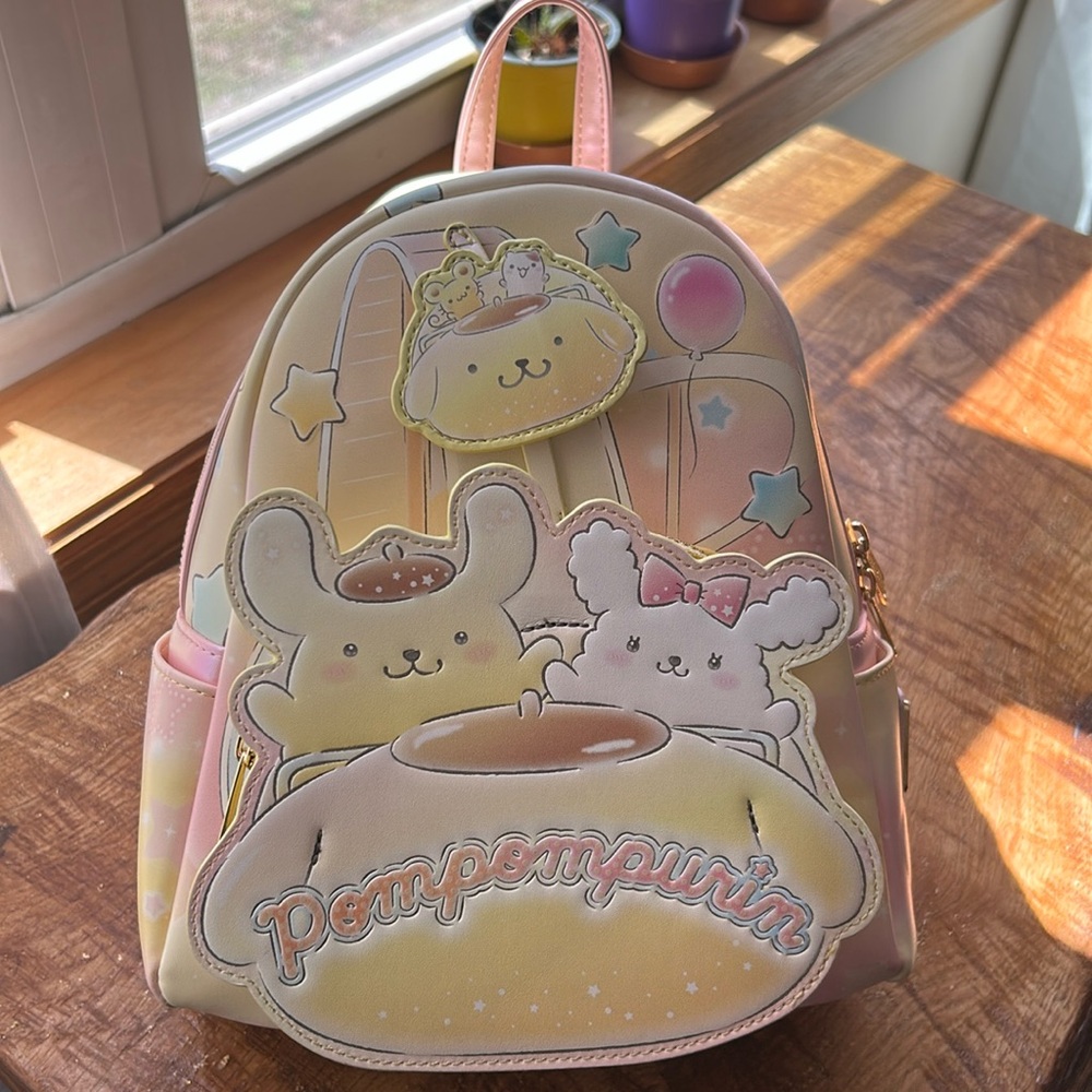 Loungefly Sanrio Pompompurin Carnival Mini Backpack.  New with tags